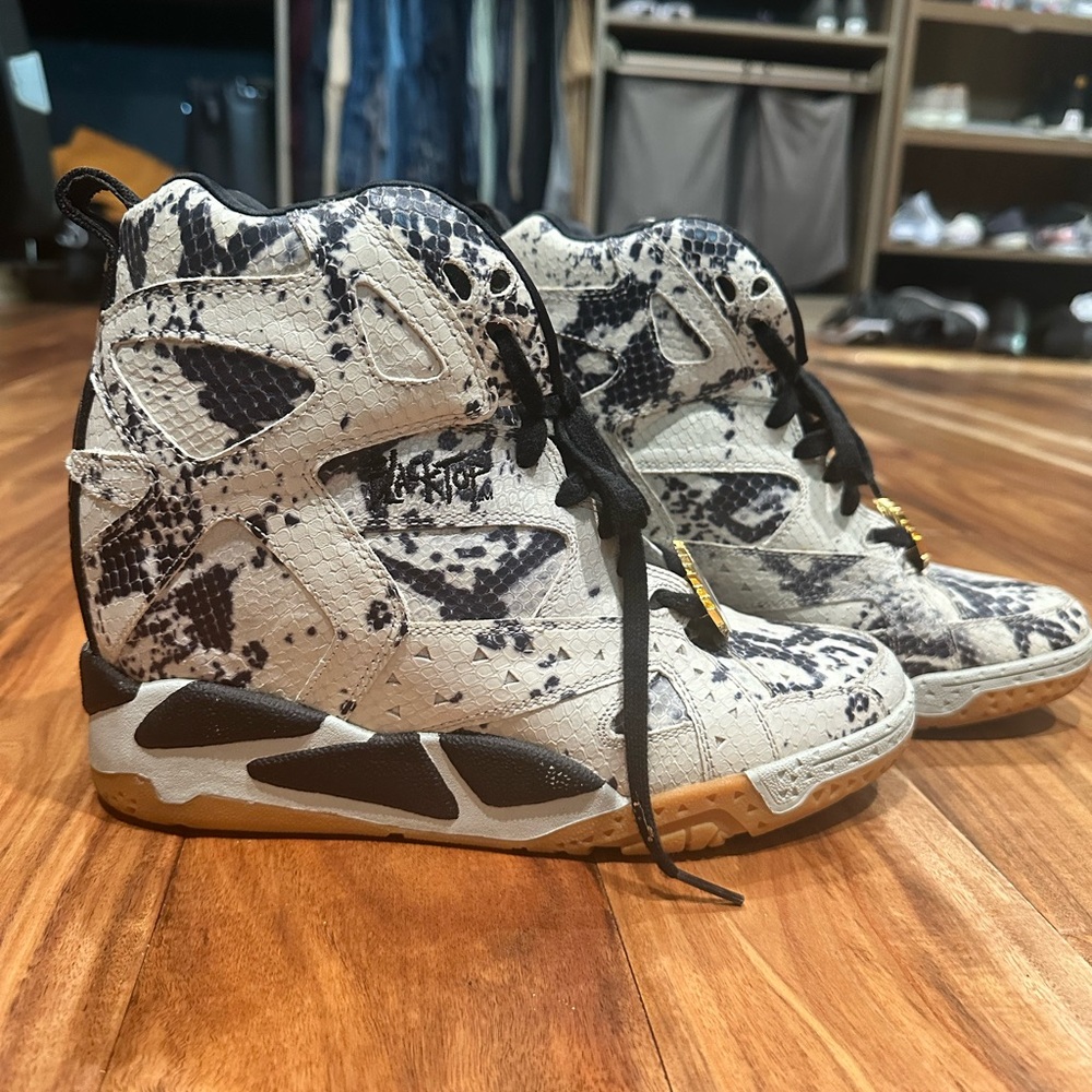 Melody Ehsani Black and White Snakeskin Reebok High-Top Sneakers